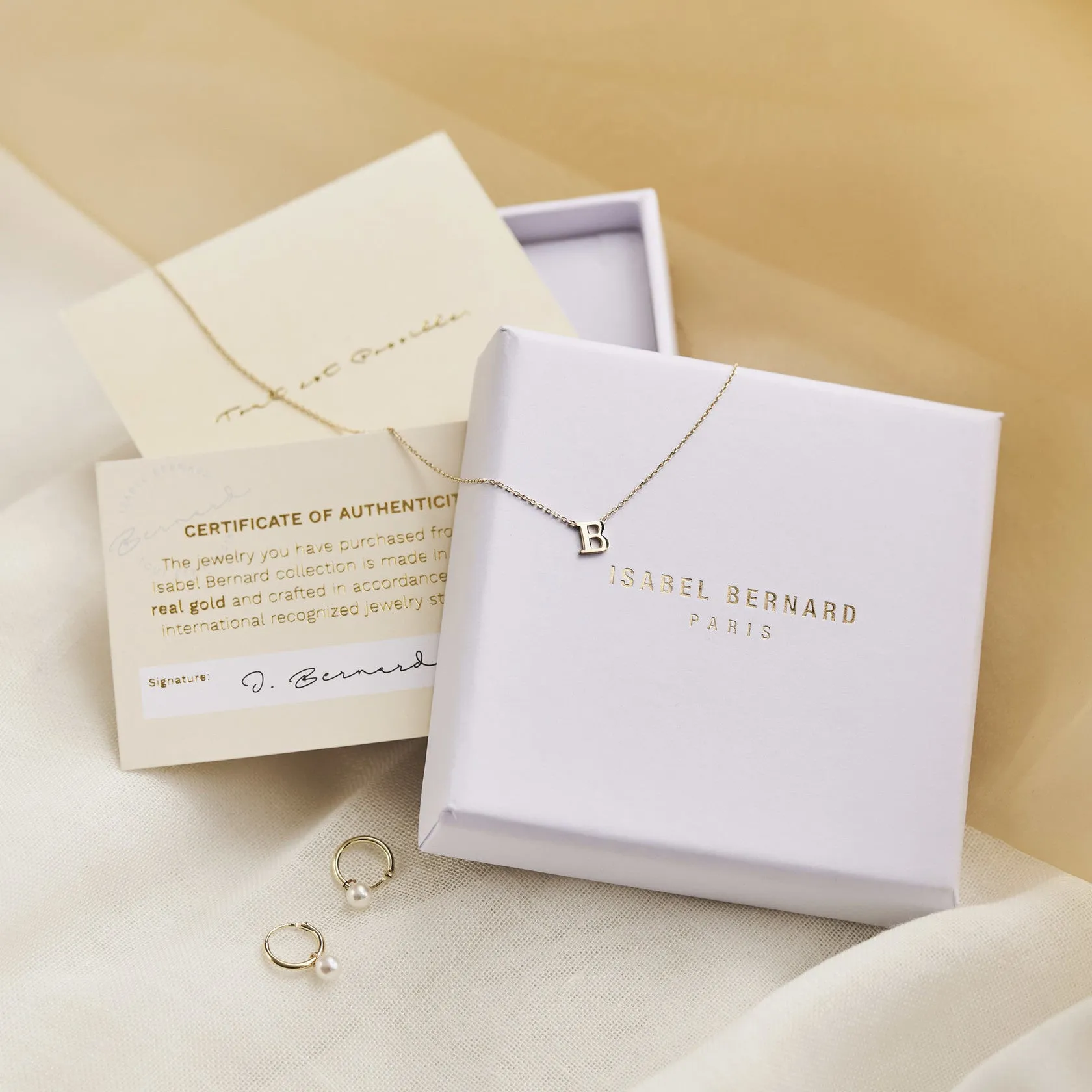 Cadeau d'Isabel 14 karat gold necklace and bracelet gift set